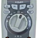 Megger AVO-850 handheld multimeter front view with circular rotary dial and two red terminal probes